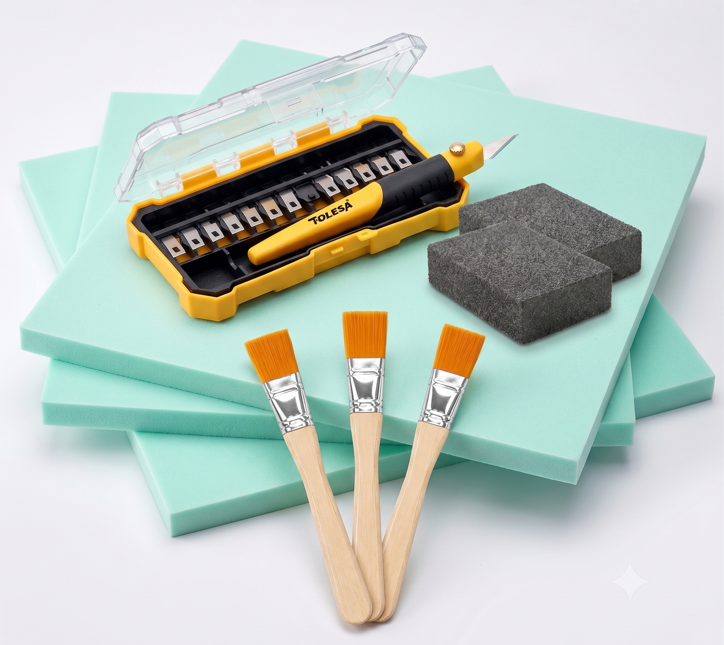 The Essential Diorama Starter Kit featuring XPS Foam, Tolesa Craft Knife, Sanding Blocks, and Crafting Brushes